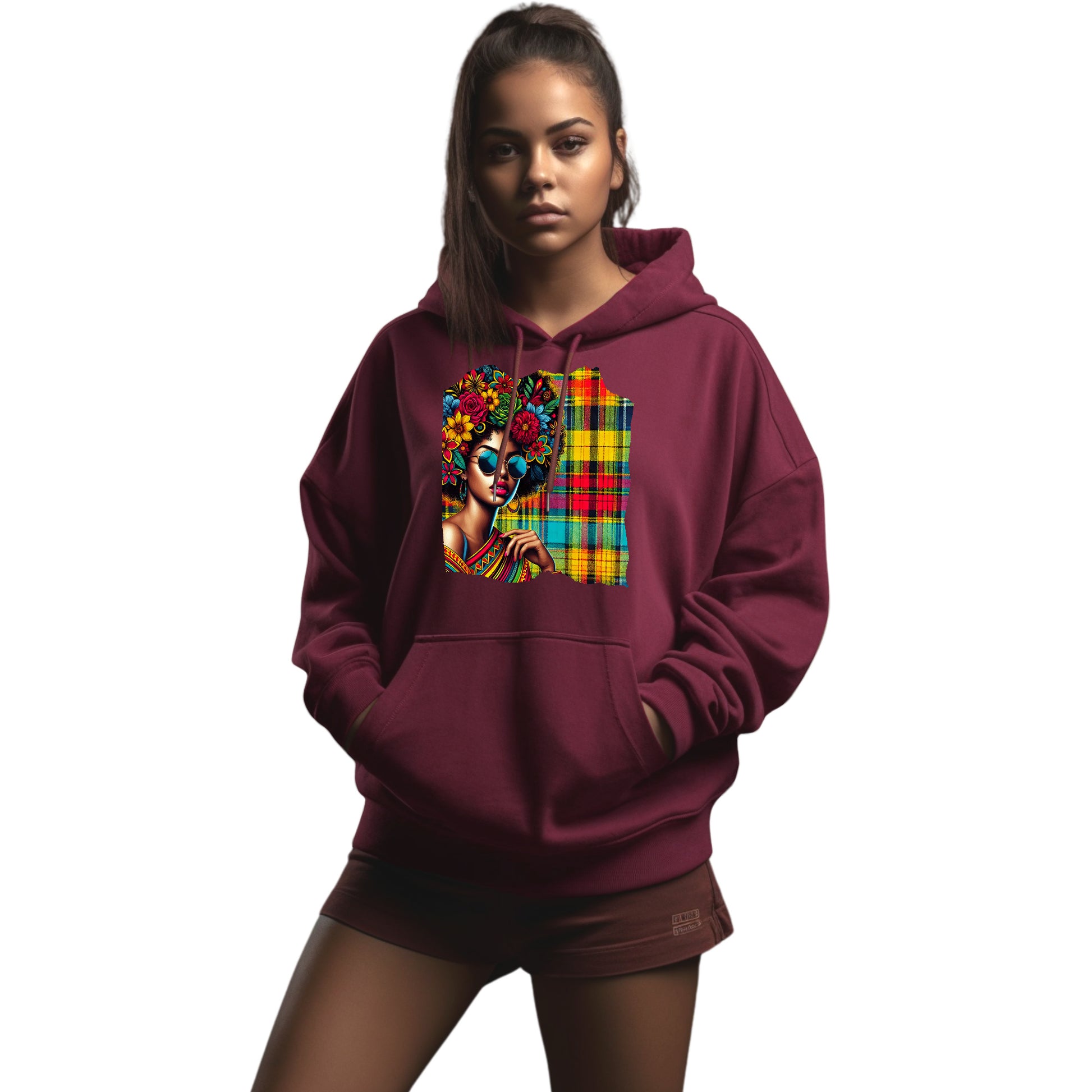 Unisex Afro hoodie featuring a bold Madras pattern and sunglasses design. Inspired by Caribbean culture from Guadeloupe. Soft cotton-poly blend with drawstring hood and front pocket. Stylish and comfortable streetwear for men and women. Perfect as a gift or statement piece. Available in sizes XS to XXL.