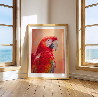 High-quality Ara parrot wall art with vibrant red feathers and a glowing warm orange background. Printed on 200 gsm semi-glossy FSC-certified paper, this tropical bird poster adds bold color to nurseries, bathrooms or beach-style interiors. Available in A4–A0 and standard sizes like 30×40 cm and 50×70 cm. A perfect gift for bird lovers and exotic art fans. Be proud. Be kind. Be wild – by Dezinbazar.