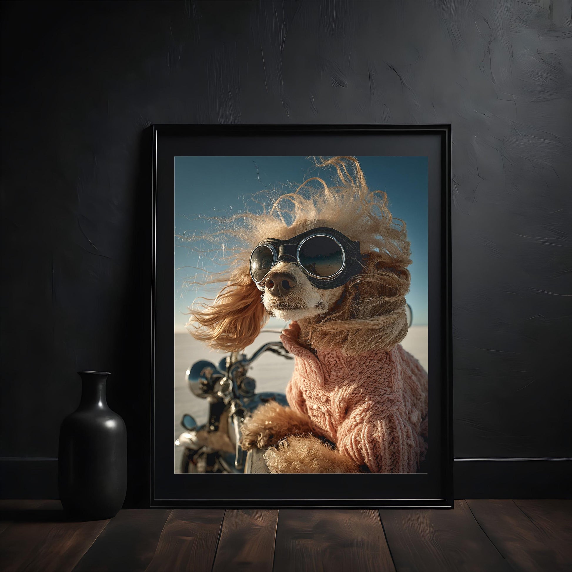 Funny apricot poodle with retro aviator goggles and pink sweater riding a motorcycle. Printed as premium wall art on FSC-certified semi-glossy paper (200 gsm), perfect for bathroom, guest toilet, or dog lovers' spaces. Available in DIN and standard poster sizes. Quirky and eye-catching decoration. Be proud. Be kind. Be wild – by Dezinbazar.
